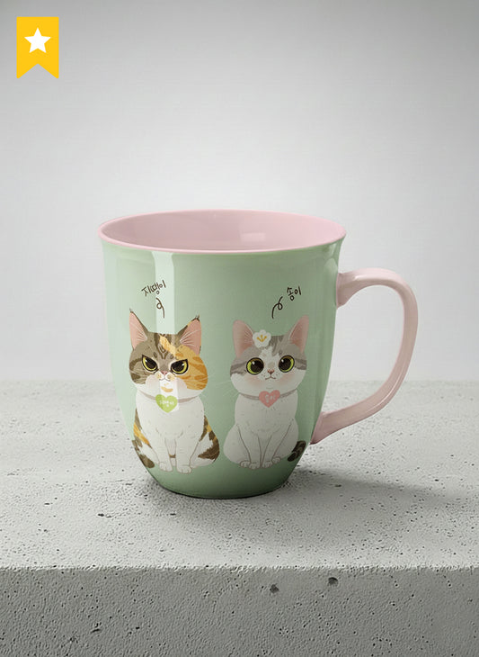 Ronny Mug | The Perfect Pair mug two cats with Korean name tags and bow ties on mint green, blush pink interior, by Hyun Jung Cho