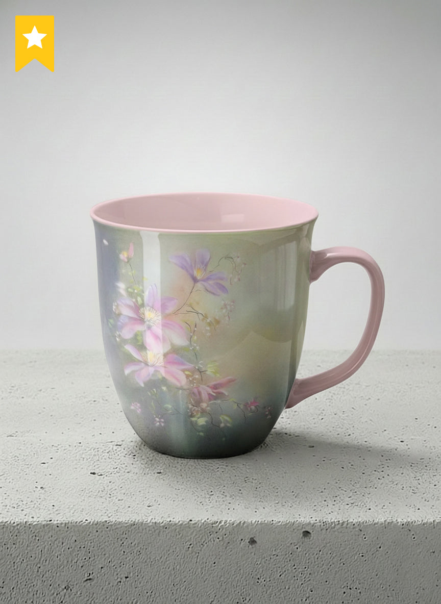 ronny mug | Ethereal Blossoms mug, soft pink clematis flowers glowing against a deep moody sage green mist, blush pink interior and handle, by Karina Mosser - Gallery By Inhesion