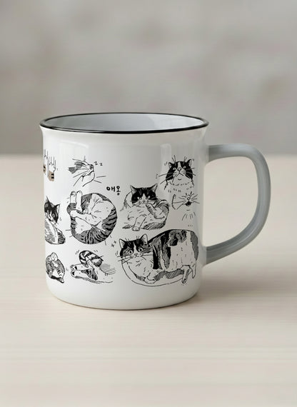 enamel mug | Moments of Curiosity mug  ink-sketched cats in playful poses with Korean script on white, grey interior, by Hyun Jung Cho