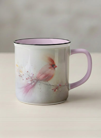 Enamel mug | lossom Visitor mug, a delicate pink cardinal perched on a wispy blossom branch against a soft ivory mist, blush pink interior and handle, by Karina Mosser - Gallery By Inhesion