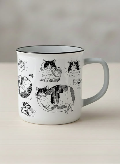 Enamel mug | Moments of Curiosity mug  ink-sketched cats in playful poses with Korean script on white, grey interior, by Hyun Jung Cho