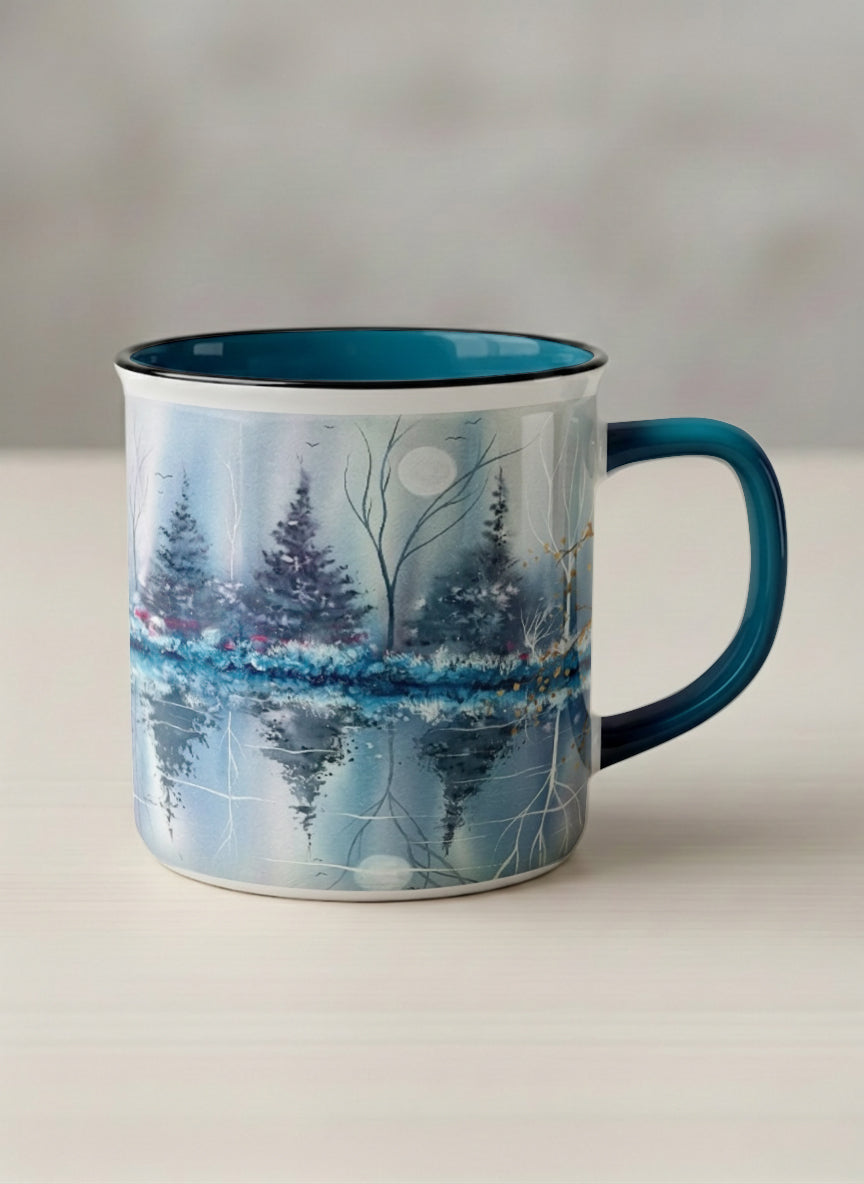 Enamel Mug | Winter Reflections on a Frosted Slope mug showing a serene landscape with trees, water, and a moon design by Renee Pupetz - Gallery By Inhesion