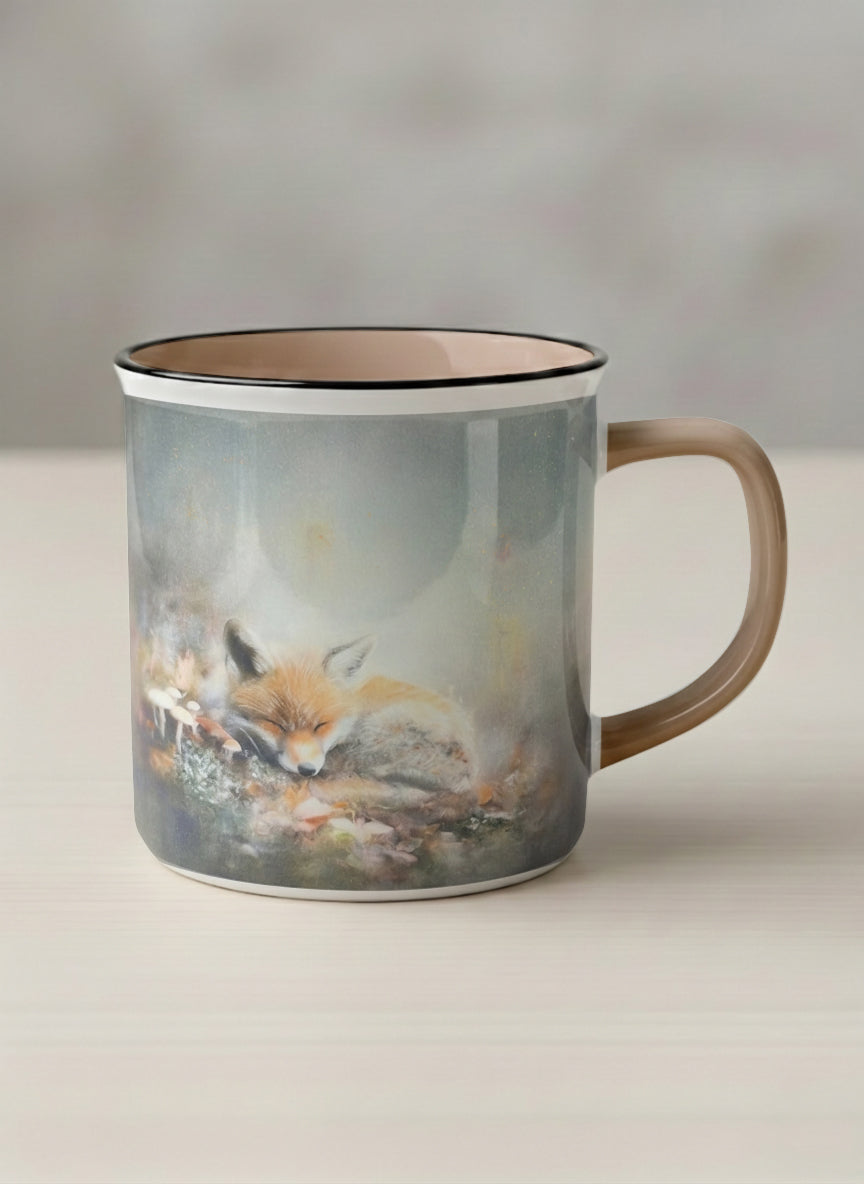 Enamel mug | Lullaby mug, sleeping fox curled in a soft misty meadow, warm terracotta interior and handle, by Karina Mosser - Gallery By Inhesion