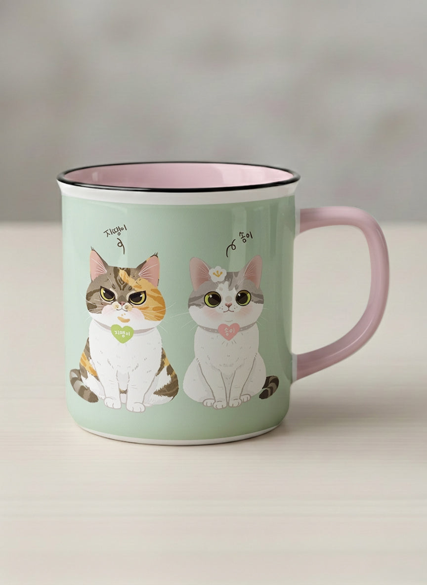 Enamel Mug | The Perfect Pair mug two cats with Korean name tags and bow ties on mint green, blush pink interior, by Hyun Jung Cho