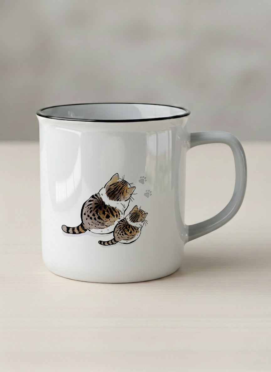 enamel mug | By Your Side mug with two cats and paw prints, by Hyun Jung Cho- Gallery By Inhesion