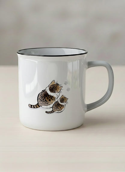 enamel mug | By Your Side mug with two cats and paw prints, by Hyun Jung Cho- Gallery By Inhesion