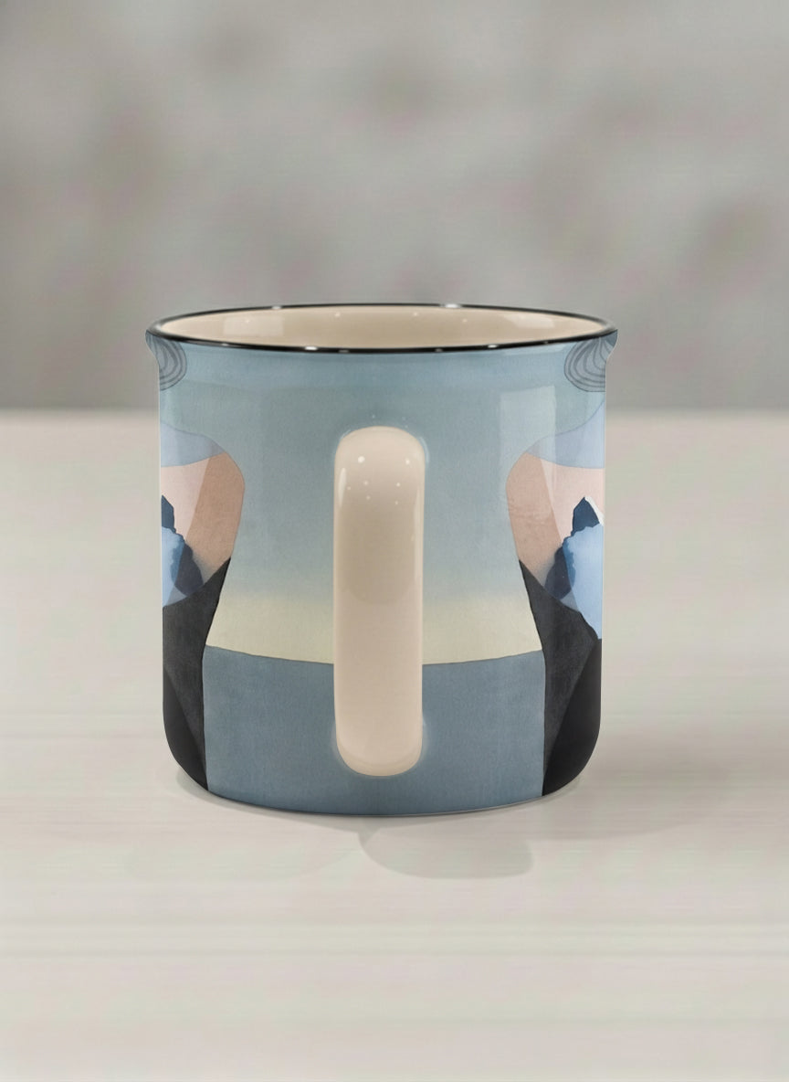 enamel mug | A Mountain to Climb side view mug woman gazing over jagged peaks and a golden sun on teal horizon, butter yellow interior, by KikaG - Gallery By Inhesion