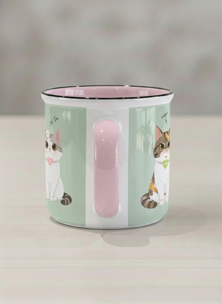 Enamel Mug | The Perfect Pair side view mug two cats with Korean name tags and bow ties on mint green, blush pink interior, by Hyun Jung Cho