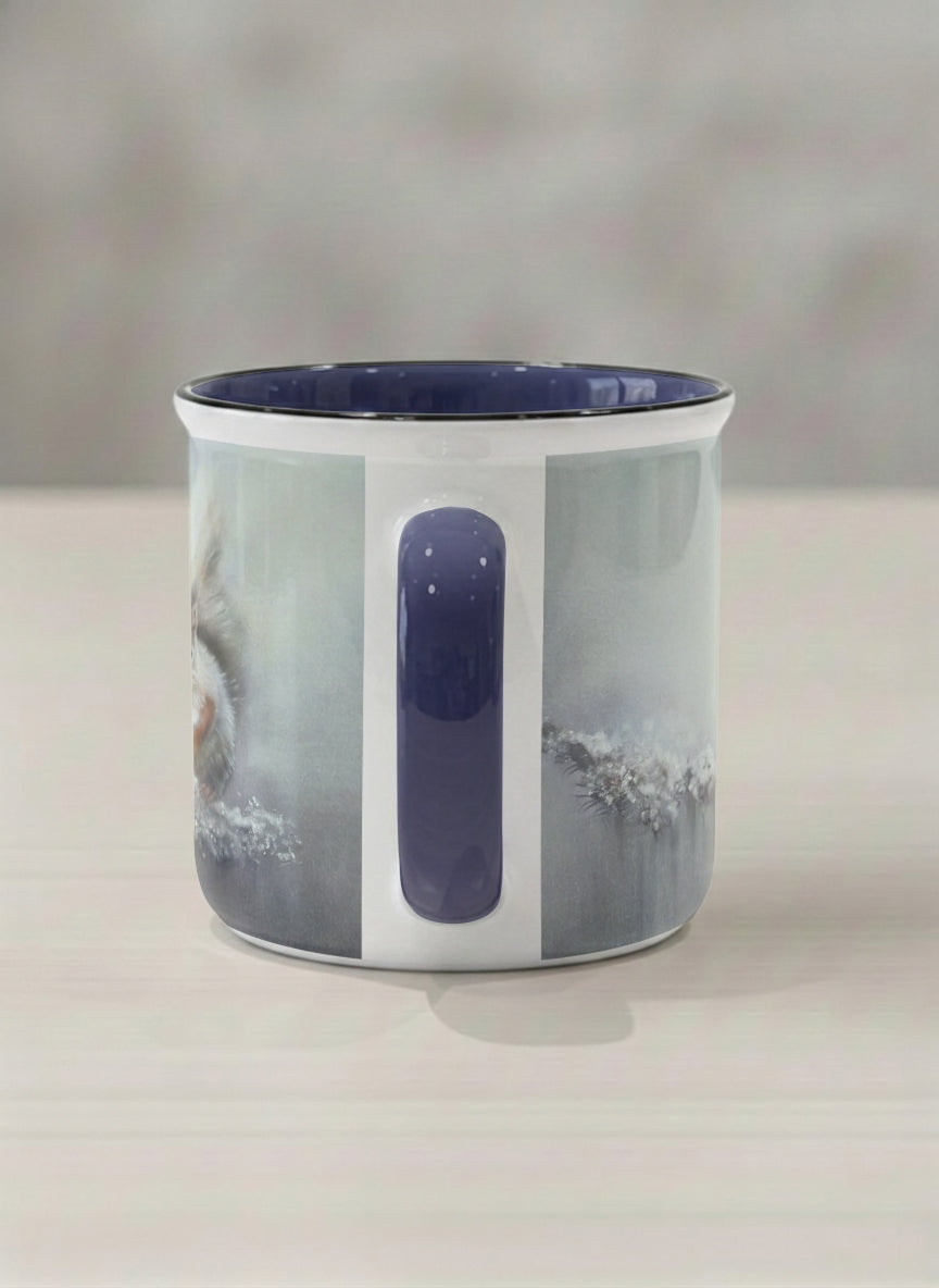 Enamel mug | Caught in Frost side view mug, wide-eyed squirrel emerging from a misty winter ground, slate blue interior and handle, by Karina Mosser - Gallery By Inhesion