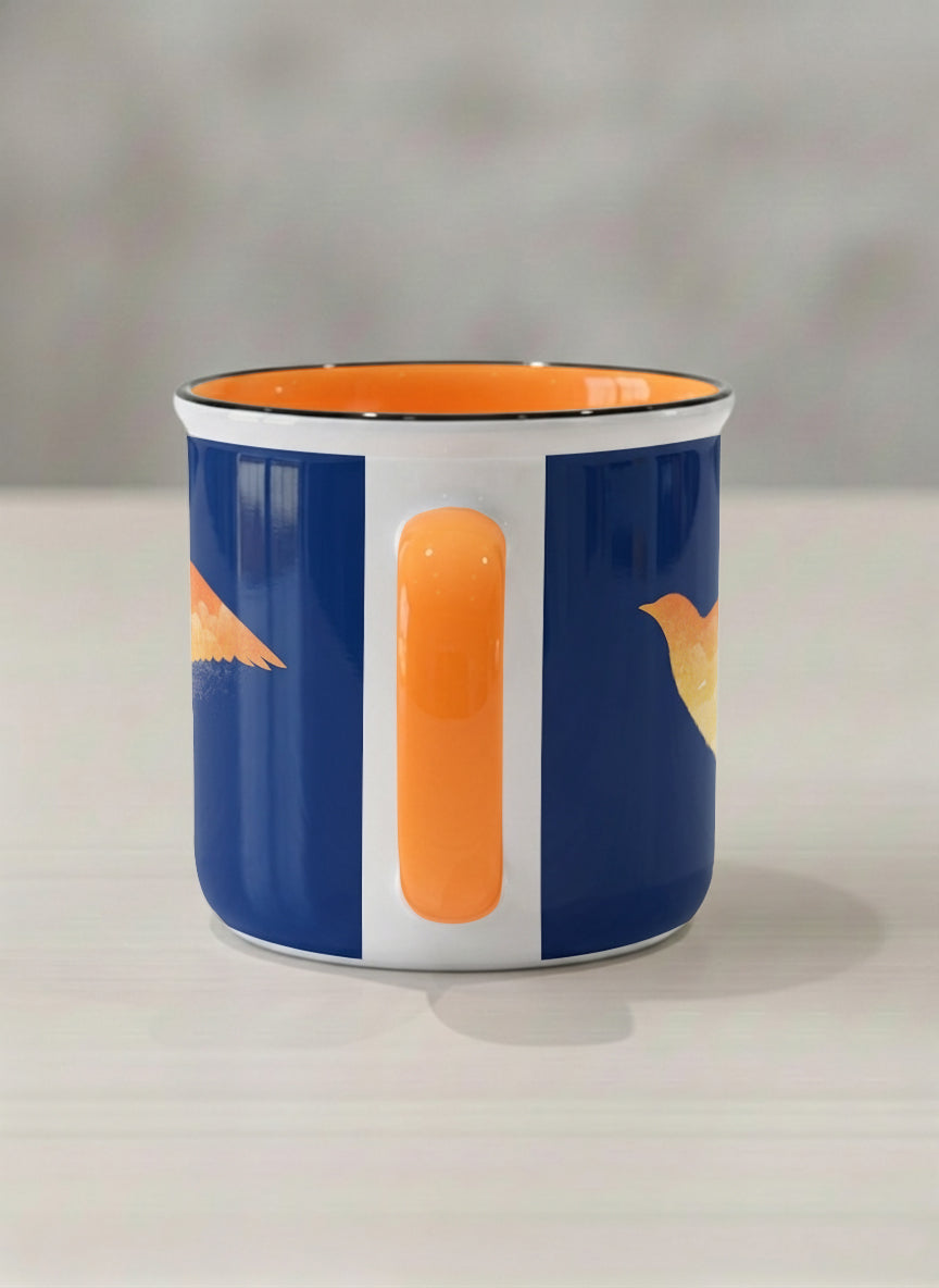 Enamel Mug | Dream Big side view mug with surreal flying bird illustration in sunset colors by Tang Yau Hoong - Gallery By Inhesion