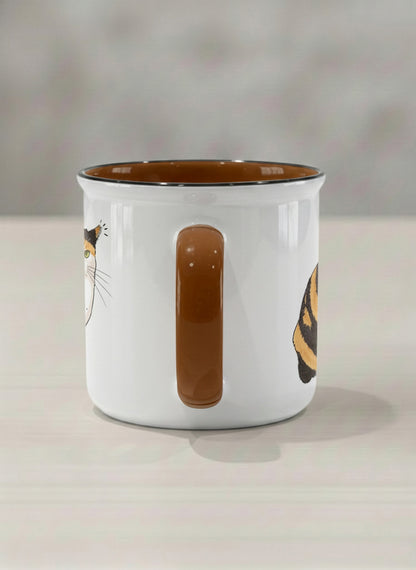 enamel Mug | Spicy Calico side view mug grumpy calico cat with piercing green eyes and ruffled fur, dark chocolate interior, by Hyun Jung Cho