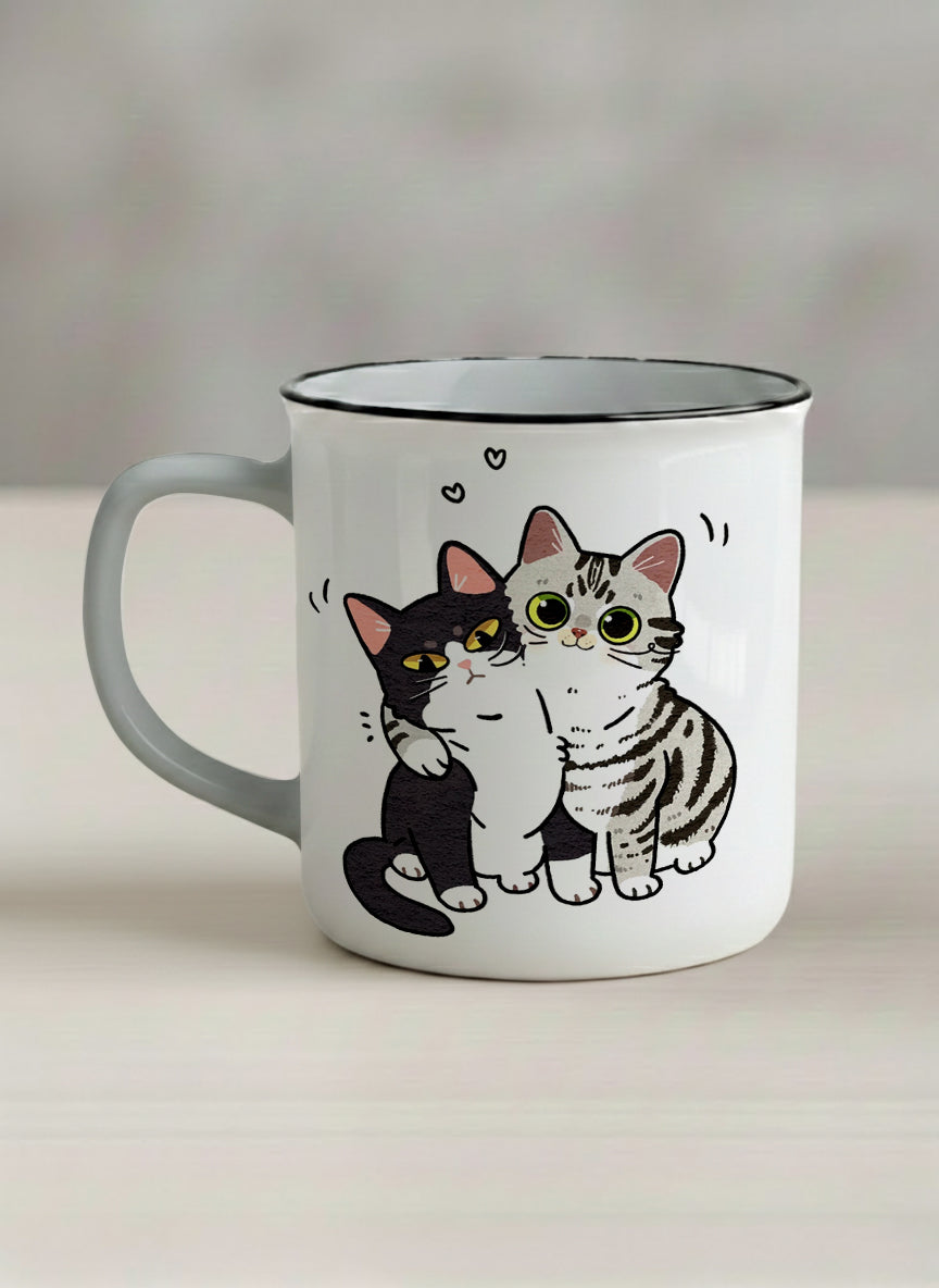 enamel mug | Best Buddies left view mug small tuxedo cat leaning into a chubby tabby with tiny floating hearts, sage interior, by Hyun Jung Cho