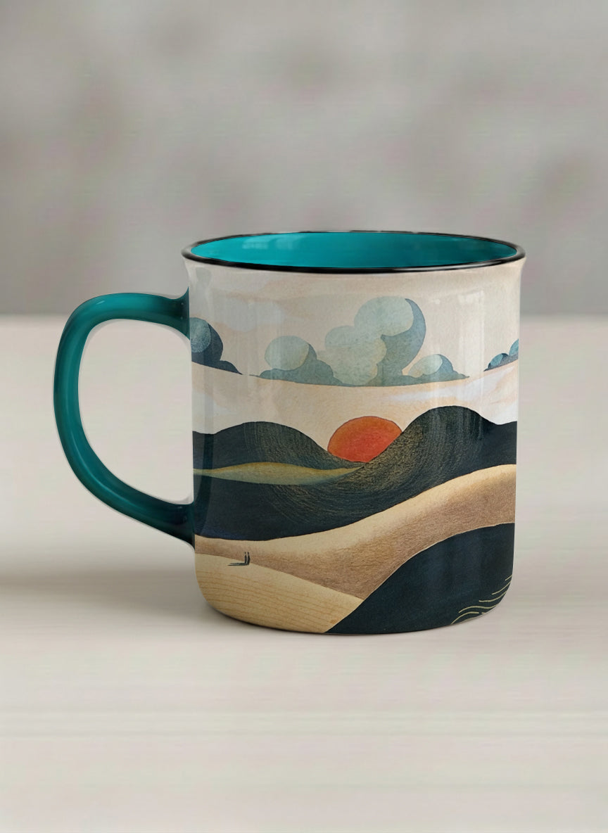 enamel mug | Share a Sunset left view  mug a lone figure walking through rolling sand dunes beneath a glowing orange sun and layered teal clouds, deep teal interior and handle, by KikaG - Gallery By Inhesion