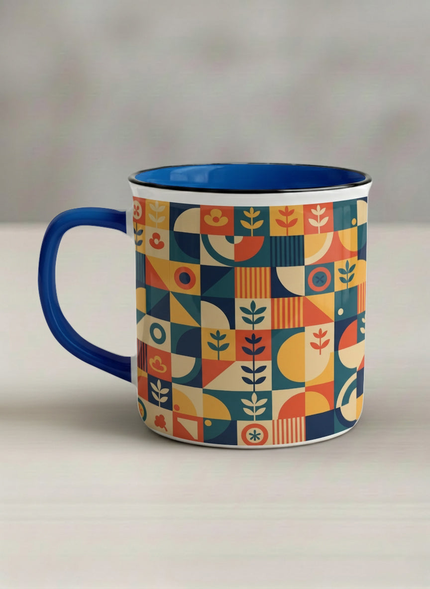 Enamel Mug | Bloom Across Realities left view mug, bold geometric pattern, blue interior and handle, concrete surface  by Alan CL Lee - Gallery By Inhesion