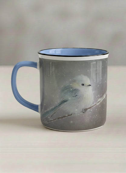 enamel mug | A Moment in the Snow left view mug, a fluffy white bird perched quietly in a soft wintry haze, sky blue interior and handle, by Karina Mosser - Gallery By Inhesion
