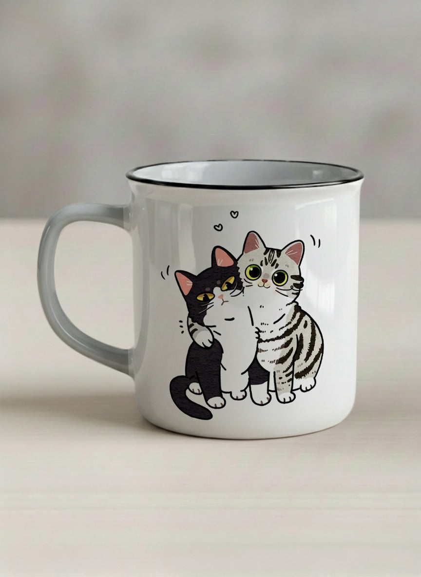 enamel Mug | Best Buddies left view mug small tuxedo cat leaning into a chubby tabby with tiny floating hearts, sage interior, by Hyun Jung Cho