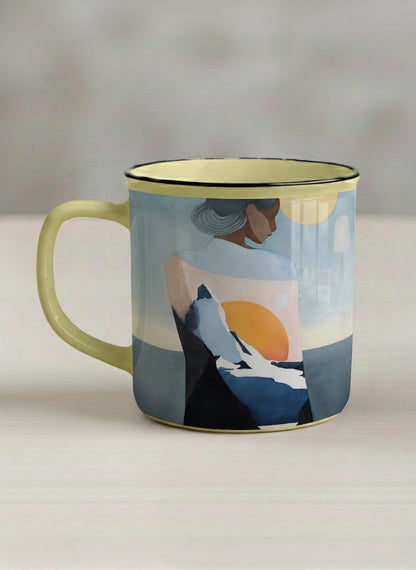 Enamel mug | A Mountain to Climb left view mug woman gazing over jagged peaks and a golden sun on teal horizon, butter yellow interior, by KikaG - Gallery By Inhesion
