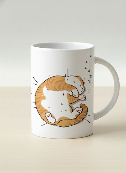 hero Mug | Sweet Dreams mug, a ginger tabby cat curled into a perfect circle fast asleep with tiny zzz's floating above, clean white interior and handle, by Hyun Jung Cho - Gallery By Inhesion