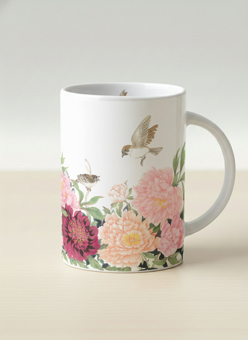 Hero Mug | A Tapestry of Flowers mug with watercolor bird flying amid pink/red flowers by Alice Wong - Gallery By Inhesion