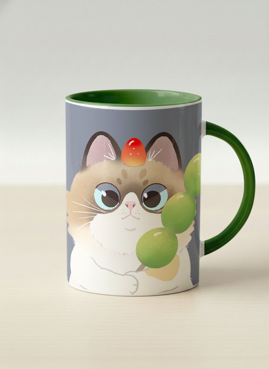 Hero Mug | My Shiny Treat mug grumpy fluffy cat clutching green grapes, tiny red mushroom hat, slate blue background, green interior, by Hyun Jung Cho