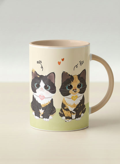 Hero mug | Our Precious Pair mug, two adorable tuxedo cats side by side with Korean name tags and tiny red hearts, soft cream interior and handle, by Hyun Jung Cho - Gallery By Inhesion