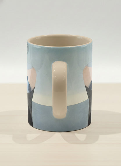 hero mug | A Mountain to Climb side view mug woman gazing over jagged peaks and a golden sun on teal horizon, butter yellow interior, by KikaG - Gallery By Inhesion