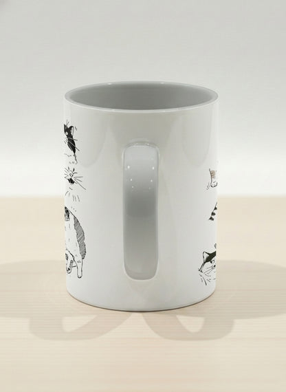 hero mug | Moments of Curiosity side view mug  ink-sketched cats in playful poses with Korean script on white, grey interior, by Hyun Jung Cho