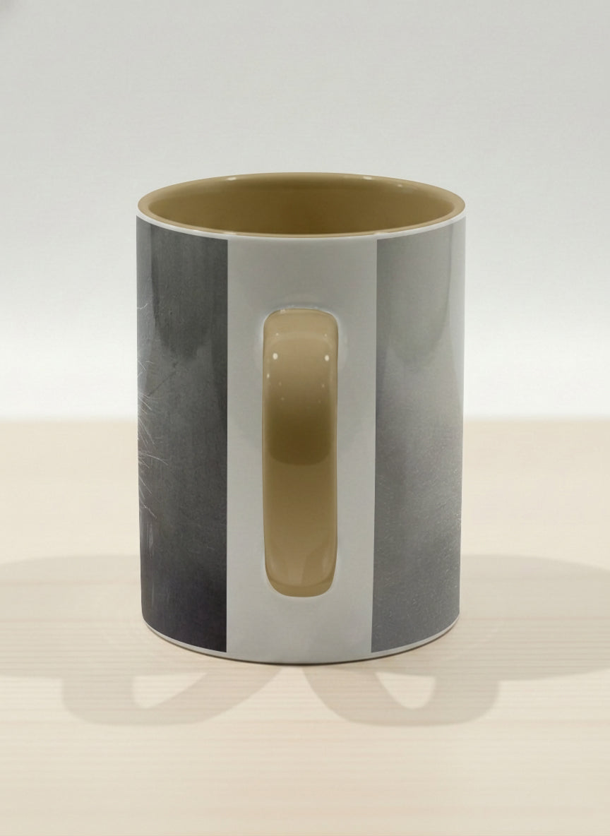 Hero Mug | Wild and Free side view mug, photorealistic cat portrait emerging from a soft smoky mist, warm beige interior and handle, by Karina Mosser - Gallery By Inhesion