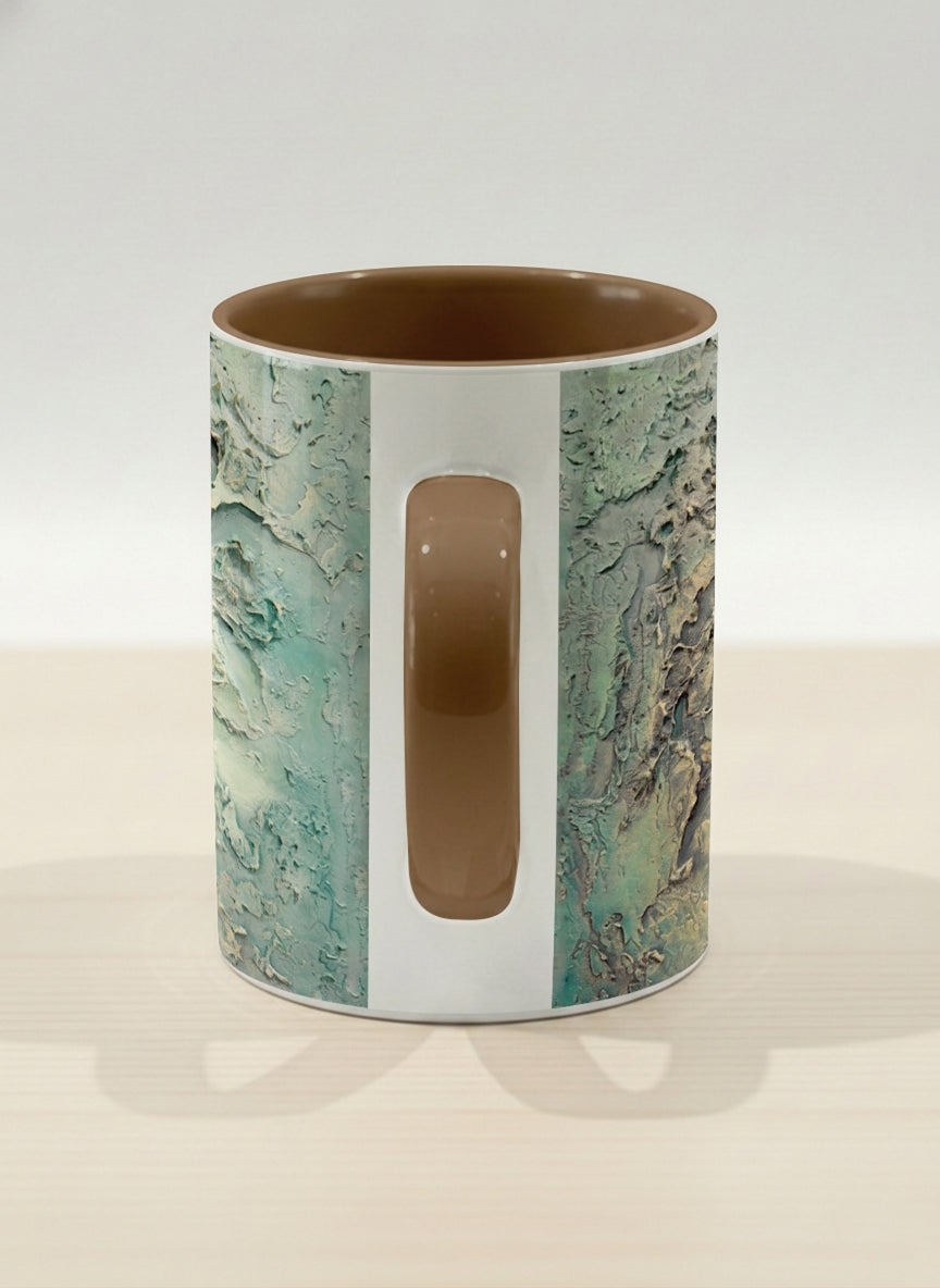 Hero Mug | Green textured side view mug with earthy, weathered pattern and brown handle on a light surface by Mersedes Mein - Gallery By Inhesion