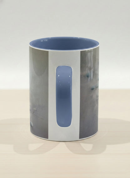 hero mug | A Quiet Moment side view mug, solitary bird perched in a soft misty landscape with delicate dot details, dusty blue interior and handle, by Karina Mosser - Gallery By Inhesion