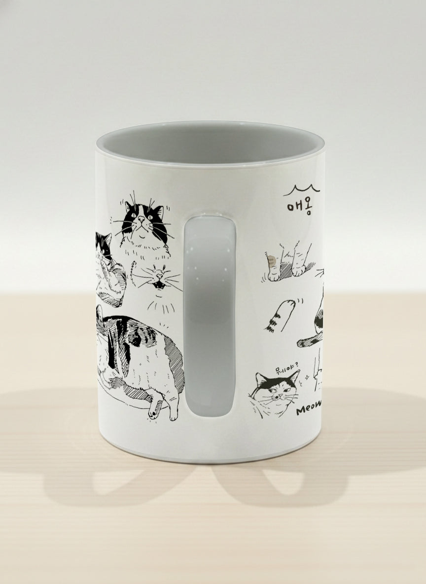 Hero mug | Moments of Curiosity side view mug  ink-sketched cats in playful poses with Korean script on white, grey interior, by Hyun Jung Cho