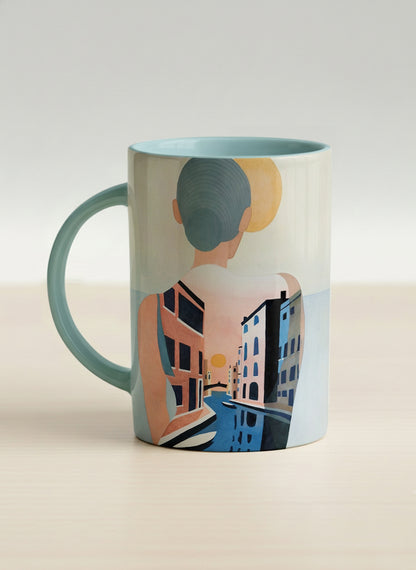 hero mug | Memory on the Bridge left view mug a solitary figure gazing over a sunlit Venetian canal lined with terracotta buildings, soft powder blue interior and handle, by KikaG - Gallery By Inhesion