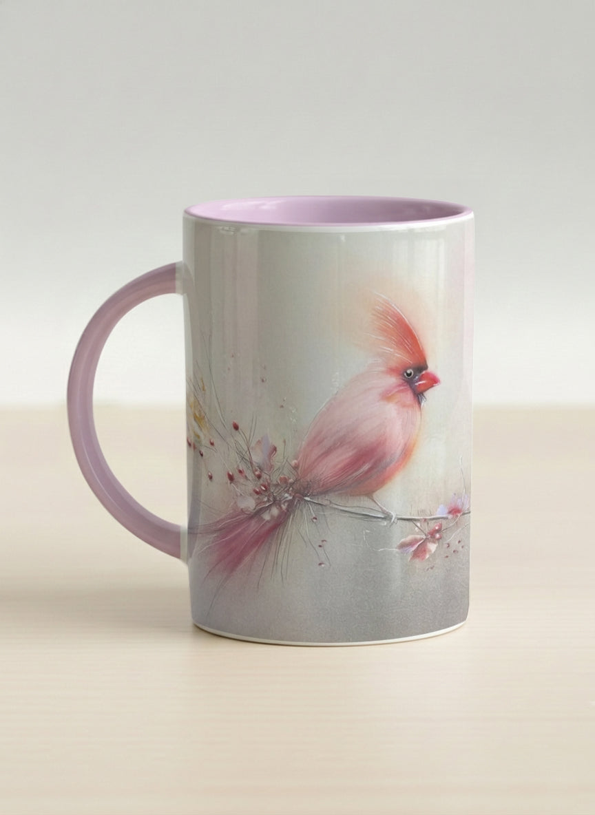 Hero mug | lossom Visitor left view mug, a delicate pink cardinal perched on a wispy blossom branch against a soft ivory mist, blush pink interior and handle, by Karina Mosser - Gallery By Inhesion