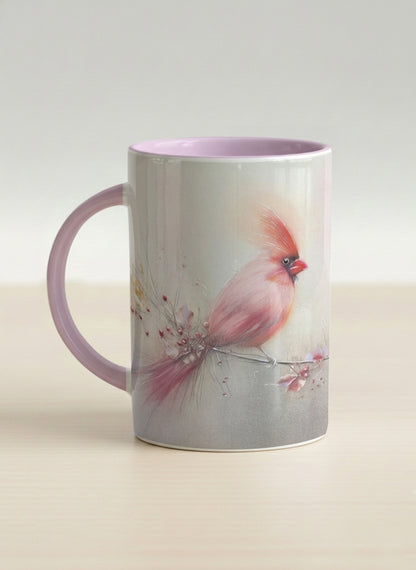 Hero mug | lossom Visitor left view mug, a delicate pink cardinal perched on a wispy blossom branch against a soft ivory mist, blush pink interior and handle, by Karina Mosser - Gallery By Inhesion