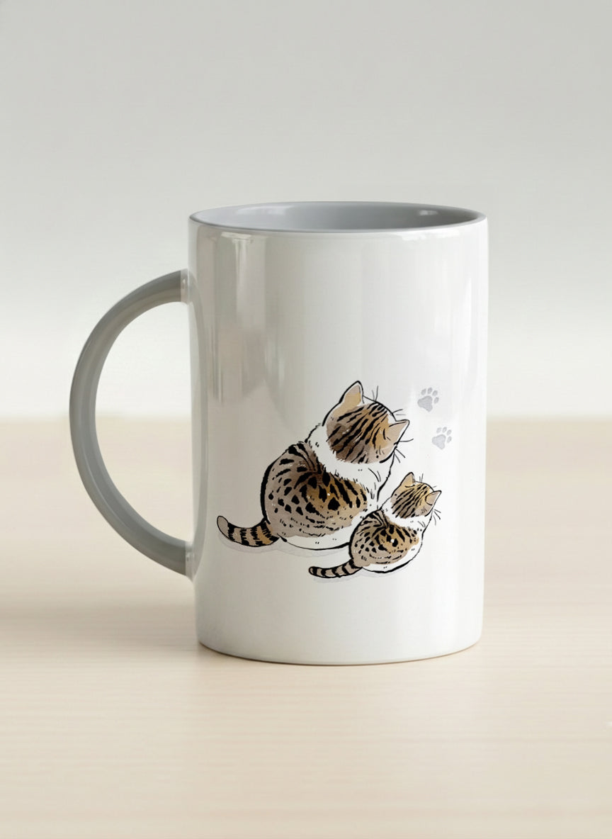 hero mug | By Your Side side view mug with two cats and paw prints, by Hyun Jung Cho- Gallery By Inhesion
