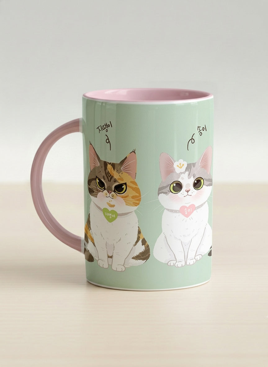 Hero Mug | The Perfect Pair left view mug two cats with Korean name tags and bow ties on mint green, blush pink interior, by Hyun Jung Cho