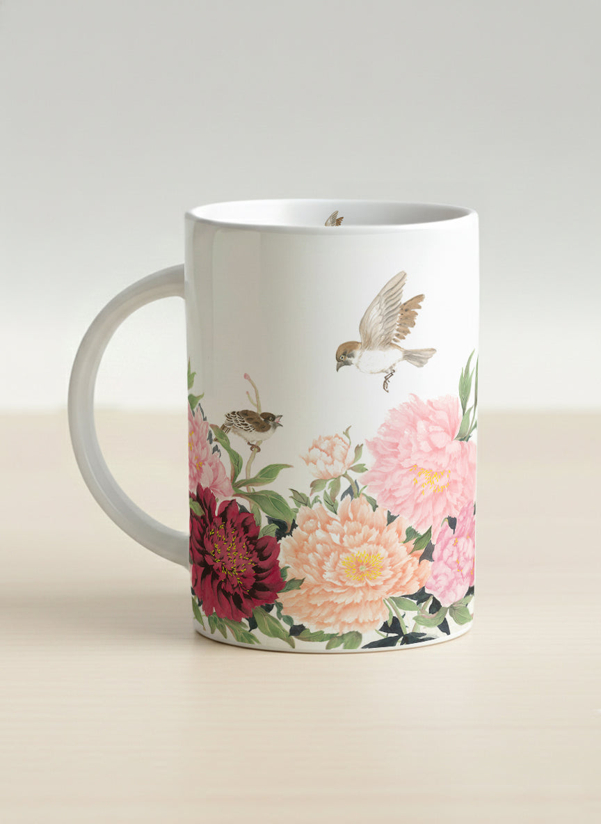 Hero Mug | A Tapestry of Flowers left view mug with watercolor bird flying amid pink/red flowers by Alice Wong - Gallery By Inhesion