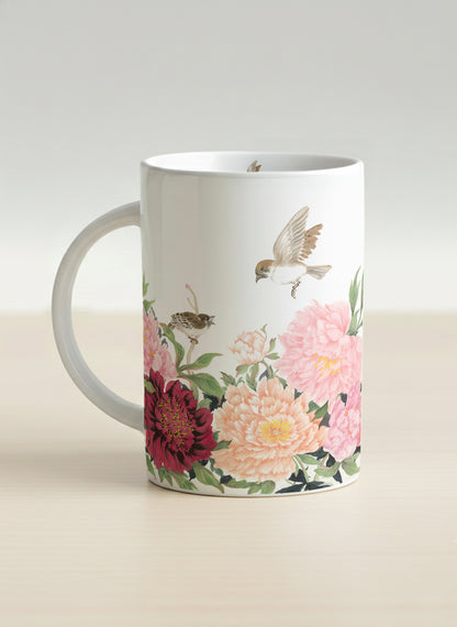 Hero Mug | A Tapestry of Flowers left view mug with watercolor bird flying amid pink/red flowers by Alice Wong - Gallery By Inhesion