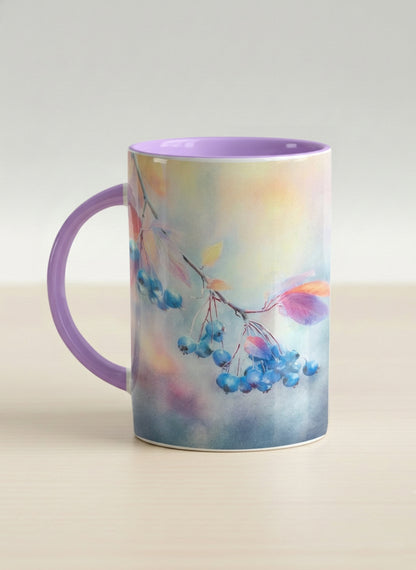 hero mug | Frosted Morning left view mug, vivid blue berries and autumn leaves drifting across a dreamy pastel rainbow wash, soft lavender interior and handle, by Karina Mosser - Gallery By Inhesion