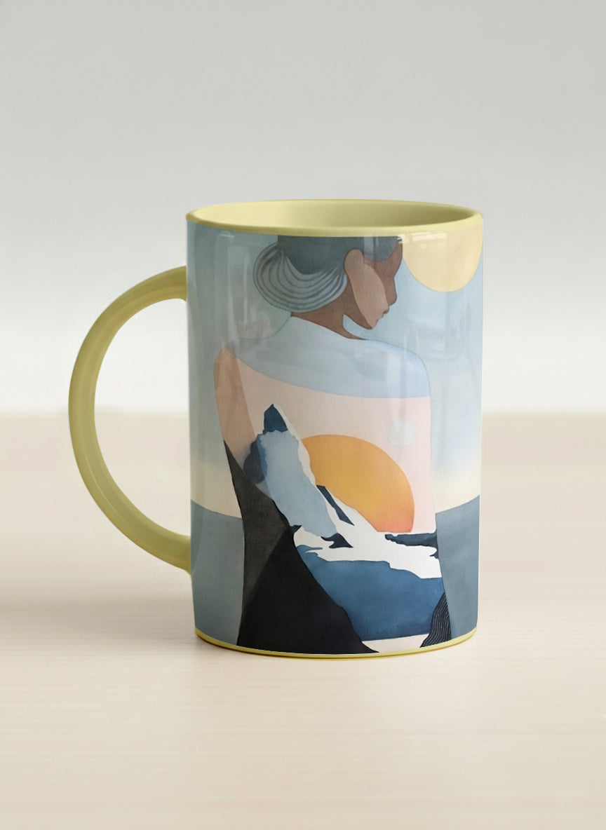 Hero mug | A Mountain to Climb left view mug woman gazing over jagged peaks and a golden sun on teal horizon, butter yellow interior, by KikaG - Gallery By Inhesion
