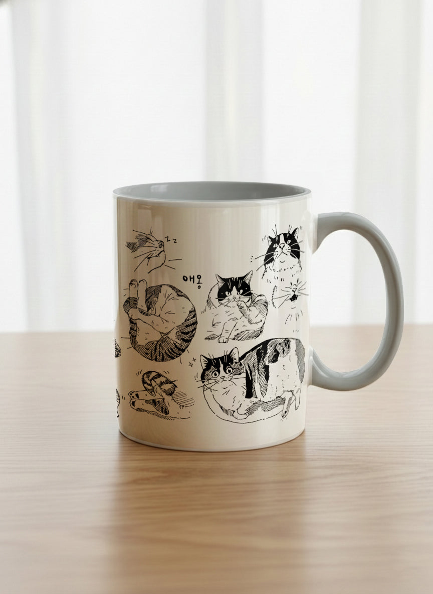Classic mug | Moments of Curiosity mug  ink-sketched cats in playful poses with Korean script on white, grey interior, by Hyun Jung Cho