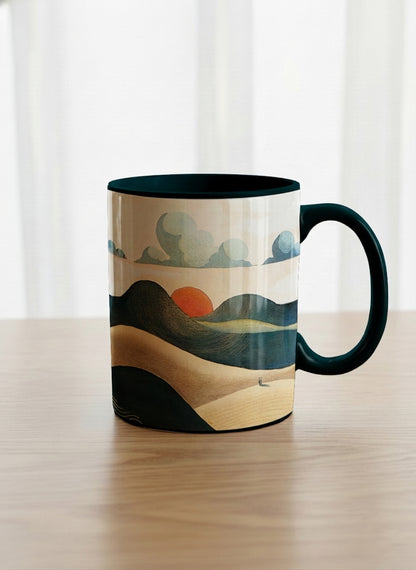 Classic mug | Share a Sunset mug a lone figure walking through rolling sand dunes beneath a glowing orange sun and layered teal clouds, deep teal interior and handle, by KikaG - Gallery By Inhesion