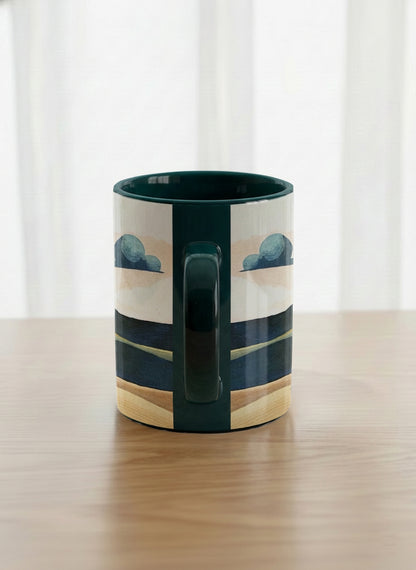 Classic mug | Share a Sunset side view mug a lone figure walking through rolling sand dunes beneath a glowing orange sun and layered teal clouds, deep teal interior and handle, by KikaG - Gallery By Inhesion