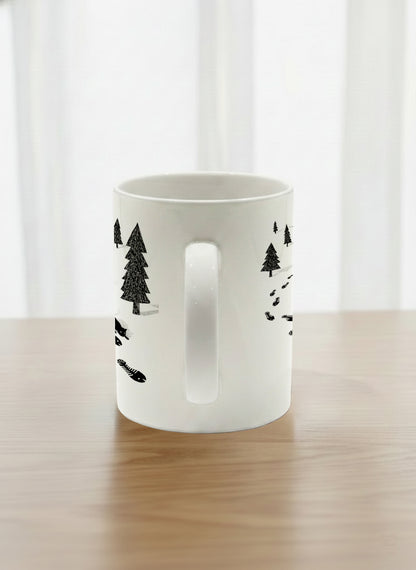 Classic Mug | The Curious Cat side view mug shows a sketch of a cat following fish-shaped footprints by Tang Yau Hoong - Gallery By Inhesion