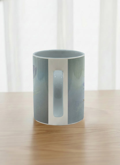 classic mug | Glass Petals side view mug, a delicate translucent poppy bloom emerging from a soft misty blue-grey wash, matching powder blue interior and handle, by Karina Mosser - Gallery By Inhesion