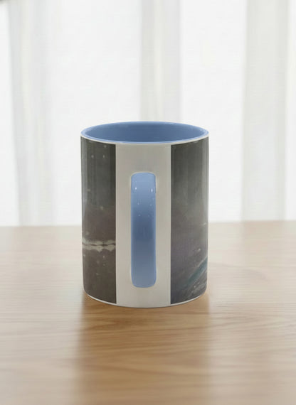 classic mug | A Moment in the Snow side view mug, a fluffy white bird perched quietly in a soft wintry haze, sky blue interior and handle, by Karina Mosser - Gallery By Inhesion