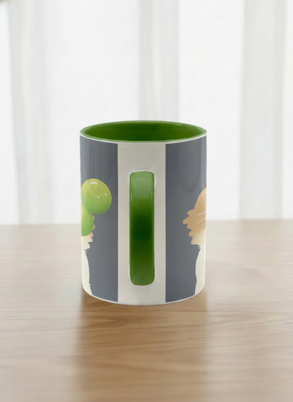 Classic Mug | My Shiny Treat side view mug grumpy fluffy cat clutching green grapes, tiny red mushroom hat, slate blue background, green interior, by Hyun Jung Cho
