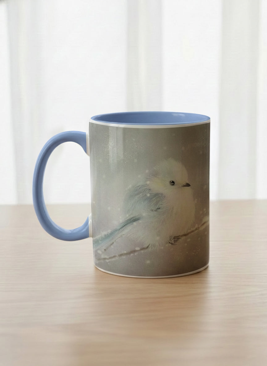 classic mug | A Moment in the Snow left view mug, a fluffy white bird perched quietly in a soft wintry haze, sky blue interior and handle, by Karina Mosser - Gallery By Inhesion