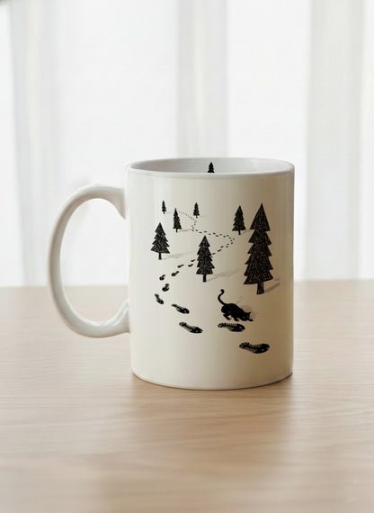 Classic Mug | The Curious Cat left view mug shows a sketch of a cat following fish-shaped footprints by Tang Yau Hoong - Gallery By Inhesion