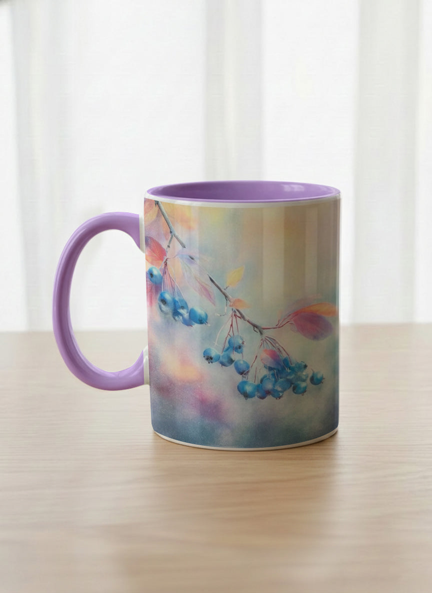 classic mug | Frosted Morning side view mug, vivid blue berries and autumn leaves drifting across a dreamy pastel rainbow wash, soft lavender interior and handle, by Karina Mosser - Gallery By Inhesion